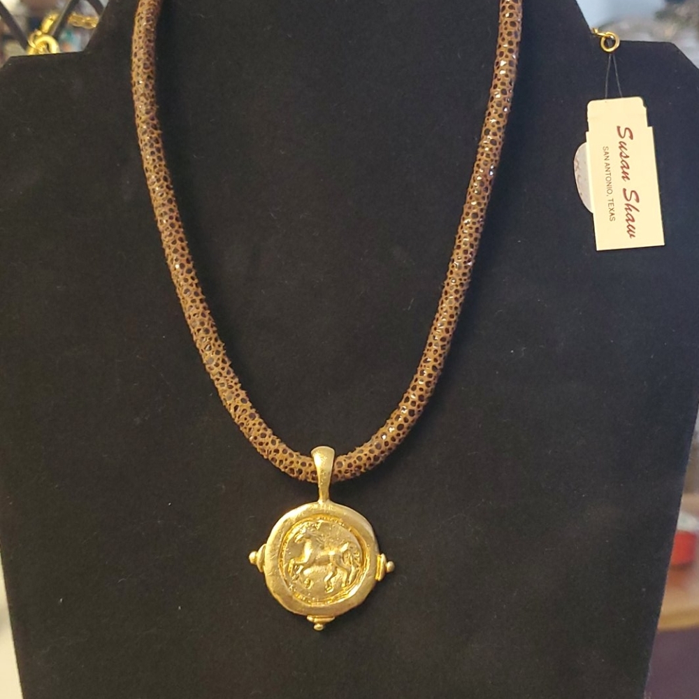 Horse medallion on leather cord